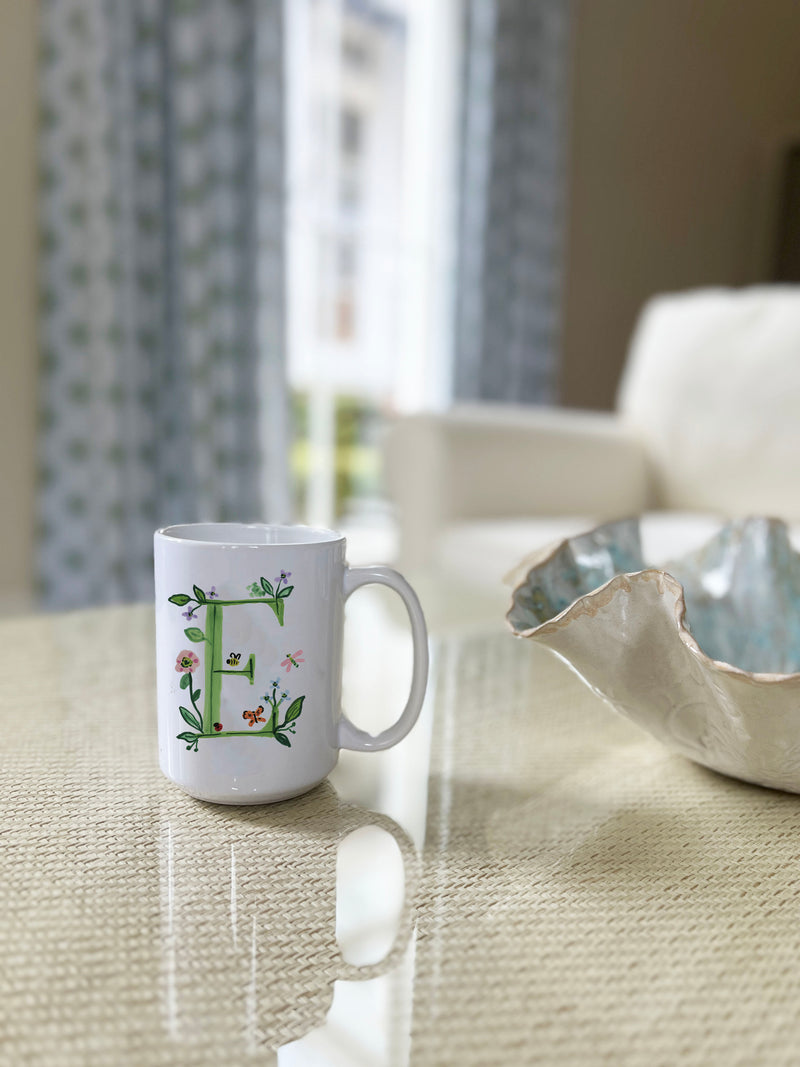 https://www.evelynhenson.com/cdn/shop/files/InitialMug_800x.jpg?v=1700686172